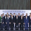 Chủ tịch nước Nguyễn Xuân Phúc với các doanh nghiệp tiêu biểu Việt Nam-Thái Lan. (Ảnh: Thống Nhất/TTXVN)