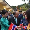 Chủ tịch nước Nguyễn Xuân Phúc gặp gỡ kiều bào tại Thái Lan. (Ảnh: Huy Tiến/TTXVN) 