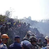 Hiện trường vụ rơi máy bay ở Pokhara, miền Trung Nepal ngày 15/1/2023. (Ảnh: AFP/TTXVN)