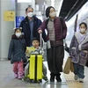 Người dân đeo khẩu trang phòng dịch COVID-19 tại ga tàu hỏa ở Seoul, Hàn Quốc, ngày 20/1/2023. (Ảnh: Yonhap/TTXVN)