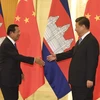 Chủ tịch Trung Quốc Tập Cận Bình (phải) và Thủ tướng Campuchia Hun Sen. (Nguồn: Thestar)