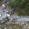 Hiện trường vụ xe buýt chở người di cư lao xuống vực tại Gualaca, Panama ngày 15/2/2023. (Ảnh: AFP/TTXVN)