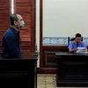 Bị cáo Nguyễn Tuấn Thanh tại phiên tòa. (Ảnh: TTXVN phát)