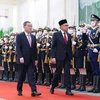 Thủ tướng Trung Quốc Lý Cường và người đồng cấp Malaysia Datuk Seri Anwar Ibrahim. (Nguồn: Xinhua)