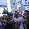 Người dân Israel tuần hành phản đối kế hoạch cải cách tư pháp của Chính phủ tại Tel Aviv, ngày 27/3/2023. (Ảnh: AFP/TTXVN)