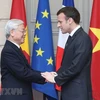 Tổng thống Emmanuel Macron đón và hội đàm với Tổng Bí thư Nguyễn Phú Trọng thăm chính thức Cộng hòa Pháp (Paris, 27/3/2018). (Ảnh: Trí Dũng/TTXVN)