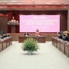 Hội nghị làm việc giữa Thường vụ Thành ủy và Đoàn công tác Học viện Chính trị Quốc gia Hồ Chí Minh. (Ảnh: TTXVN phát)