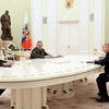 Tổng thống Nga Vladimir Putin, Bộ trưởng Quốc phòng Nga Sergei Shoigu và Bộ trưởng Quốc phòng Trung Quốc Lý Thượng Phúc tham dự một cuộc họp ở Moskva, Nga, ngày 16/4. (Nguồn: Sputnik)