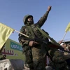Một tay súng của phong trào Hồi giáo Hezbollah. (Nguồn: Reuters)