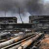 Cảng dầu Matanzas, Cuba bị hư hại sau vụ cháy kho chứa dầu, ngày 10/8/2022. (Ảnh: AFP/TTXVN)