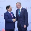 Thủ tướng Phạm Minh Chính gặp Thủ tướng Australia Anthony Albanese bên lề Hội nghị Cấp cao ASEAN diễn ra tại thủ đô Phnom Penh, Campuchia, chiều 12/11/2022. (Ảnh: Dương Giang/TTXVN)