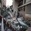 Các tòa nhà bị phá hủy sau cuộc không kích do Israel tiến hành tại Dải Gaza ngày 9/5/2023. (Ảnh: AA/TTXVN)