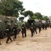 Cảnh sát Cơ động, Cảnh sát đặc nhiệm, Công an tỉnh Đắk Lắk, lực lượng đặc nhiệm Quân khu 5 phối hợp triển khai phương án vây bắt các đối. (Ảnh: Phan Anh Dũng/TTXVN)