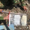 Ngày 23/6, người dân phát hiện túi nylon nghi chứa ma túy trôi dạt vào bờ biển tỉnh Quảng Trị. (Nguồn: TTXVN phát)