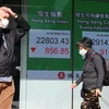 Bảng chỉ số Hang Seng tại thị trường chứng khoán Hong Kong, Trung Quốc. (Ảnh: AFP/TTXVN)