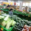 Quầy bán thực phẩm, rau củ trong Bách Hóa Xanh, quận Phú Nhuận, Thành phố Hồ Chí Minh. (Ảnh: Hồng Đạt/TTXVN)
