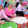 Thi cắt bánh phở tại Lễ hội Háu Đoong của đồng bào dân tộc Giáy ở Lai Châu. (Ảnh: Nguyễn Oanh/TTXVN)