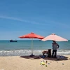 Khu vực bãi biển Ninh Chữ nơi anh N.Q.A.T bị sóng biển cuốn trôi mất tích vào chiều 11/8/2023. (Ảnh: Nguyễn Thành/TTXVN)