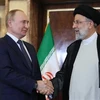 Tổng thống Iran Ebrahim Raisi (phải) và Tổng thống Nga Vladimir Putin tại cuộc gặp ở Tehran ngày 19/7/2022. (Ảnh: AFP/TTXVN)