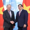 Thủ tướng Phạm Minh Chính và Tổng Thư ký Liên hợp quốc António Guterres. (Ảnh: Dương Giang/TTXVN)