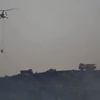 Phi đội trực thăng gồm 3 người Kyrgyzstan và một người Thổ Nhĩ Kỳ, trong đó một người Kyrgyzstan đã được giải cứu và đưa đến bệnh viện trong tình trạng ổn định. (Nguồn: Ajanslar)