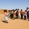 Trẻ em tại làng Wad al-Bashir, cách thành phố Omdurman của Sudan 20km về phía Tây. (Ảnh: AFP/TTXVN)