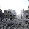 Những tòa nhà bị phá hủy sau trận oanh kích của quân đội Israel xuống thành phố Gaza, ngày 10/10/2023. (Ảnh: THX/TTXVN)