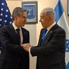 Thủ tướng Israel Benjamin Netanyahu (phải) trong cuộc gặp Ngoại trưởng Mỹ Antony Blinken đang ở thăm Tel Aviv, ngày 12/10/2023. (Ảnh: THX/TTXVN)