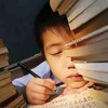 Các gia đình Trung Quốc thường đặt nhiều áp lực lên con cái để chúng đạt được thành tích cao trong học tập. (Nguồn: Beijing Daily)