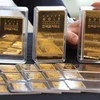 Vàng miếng được bày bán tại Sàn Giao dịch Vàng ở Seoul, Hàn Quốc. (Ảnh: Yonhap/TTXVN)