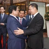 Thủ tướng Phạm Minh Chính tiễn Thủ tướng Vương quốc Campuchia Samdech Moha Bovor Thipadei Hun Manet kết thúc chuyến thăm chính thức Việt Nam. (Ảnh: Dương Giang/TTXVN)