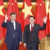 Chủ tịch Quốc hội Vương Đình Huệ và Tổng Bí thư, Chủ tịch nước Trung Quốc Tập Cận Bình chụp ảnh chung. (Ảnh: Doãn Tấn/TTXVN)