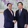 Thủ tướng Phạm Minh Chính gặp Chủ tịch Hạ viện Nhật Bản Nukaga Fukushiro. (Ảnh: Dương Giang/TTXVN)