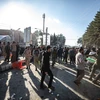 Hiện trường vụ nổ gần nghĩa trang ở thành phố Kerman, Iran, ngày 3/1/2024. (Ảnh: AFP/TTXVN)