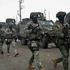 Lực lượng an ninh được triển khai tại nhà tù Regional 8 ở Guayaquil, Ecuador, ngày 7/1/2024. (Ảnh: AFP/TTXVN)