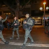 Cảnh sát Israel gác tại hiện trường một vụ tấn công bằng súng. (Ảnh: THX/TTXVN)