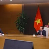 Đại sứ Nga tại Việt Nam Gennady Bezdetko trong một buổi làm việc với Phó Thủ tướng Trần Hồng Hà. (Ảnh: Văn Điệp/TTXVN)
