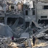 Một tòa nhà bị phá hủy sau cuộc không kích của Israel xuống thành phố Rafah, Dải Gaza ngày 12/2/2024. (Ảnh: AFP/TTXVN)