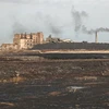 Việc khai thác và đốt nhiên liệu hóa thạch thải ra gần 120 triệu tấn khí methane. (Ảnh: AFP/TTXVN)