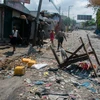 Hiện trường đổ nát sau một vụ tấn công của các băng nhóm vũ trang ở Port-au-Prince, Haiti ngày 20/3/2024. (Ảnh: AFP/TTXVN)