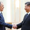 Ngoại trưởng Nga Sergei Lavrov (trái) đã có cuộc gặp với Chủ tịch Trung Quốc Tập Cận Bình ngày 9/4. (Nguồn: Reuters)