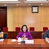 Trưởng Ban Công tác đại biểu thuộc Ủy ban Thường vụ Quốc hội Nguyễn Thị Thanh (giữa) tại buổi làm việc. (Ảnh: Tiến Trung/TTXVN)
