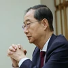 Thủ tướng Hàn Quốc Han Duck-soo trả lời phỏng vấn báo chí tại Seoul ngày 7/4/2024. (Ảnh: Yonhap/TTXVN)
