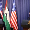 Tổng thống Mỹ Joe Biden (trái) và Tổng thống Palestine Mahmoud Abbas tại cuộc gặp ở Bờ Tây ngày 15/7/2022. (Ảnh: AFP/TTXVN)