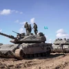 Xe quân sự Israel tham gia chiến dịch tấn công ở Rafah, phía Nam Dải Gaza ngày 10/5/2024. (Ảnh: AFP/TTXVN)