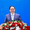 Thủ tướng Phạm Minh Chính phát biểu tại Diễn đàn Nâng cao Năng suất Lao động Quốc gia năm 2024. (Ảnh: Dương Giang/TTXVN)
