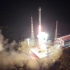 Tên lửa đẩy Chollima-1 mang theo vệ tinh Malligyong-1 rời bệ phóng ở Tongchang-ri, Tây Bắc Triều Tiên ngày 21/11/2023. (Ảnh: Yonhap/TTXVN)