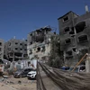 Các tòa nhà bị phá hủy sau vụ tấn công của Israel nhằm vào trại tị nạn Nuseirat ở Dải Gaza ngày 8/6/2024. (Ảnh: THX/TTXVN)