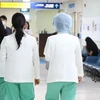 Nhân viên y tế làm việc tại Bệnh viện Đại học Quốc gia Seoul, Hàn Quốc, ngày 24/6/2024. (Ảnh: Yonhap/TTXVN)