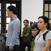 Các bị cáo Nguyễn Minh Hiếu và Kiều Thị Mai tại phiên tòa. (Ảnh: TTXVN phát)